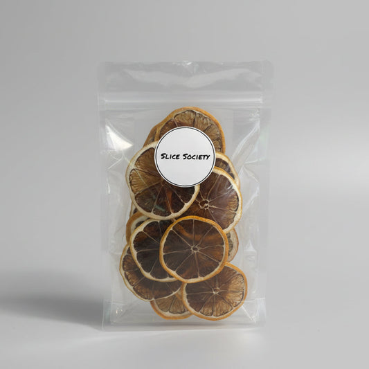 Packaged dried citrus slices with 'Slice Society' label on a light background